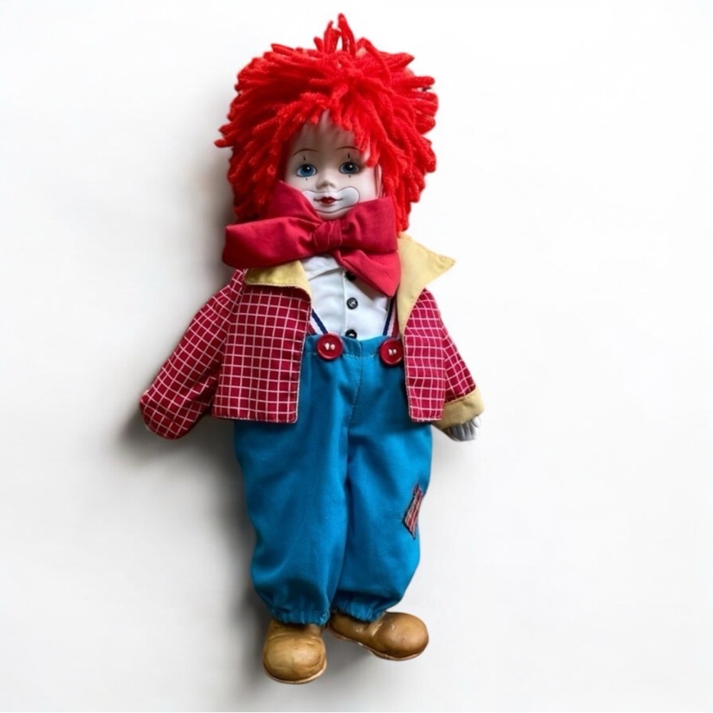 Wind up musical porcelain clown doll